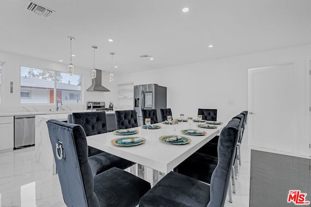 dining area featuring sink