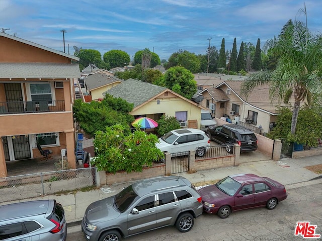 view of front of property with a balcony