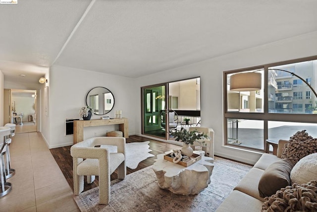 living room with light tile patterned floors