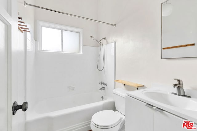 full bathroom featuring vanity, shower / bath combination, and toilet