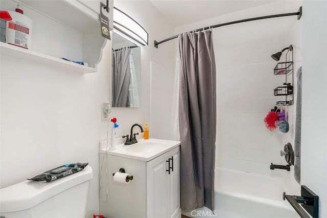 full bathroom featuring toilet, shower / bath combination with curtain, and vanity