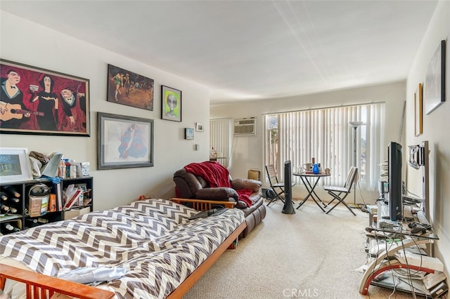 bedroom featuring carpet floors and a wall mounted air conditioner