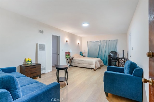 bedroom featuring light hardwood / wood-style flooring