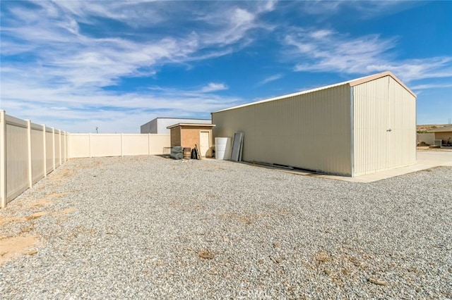 exterior space featuring a shed