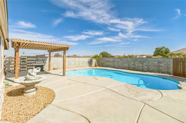 view of pool featuring a pergola and a patio area