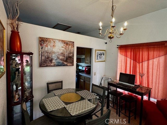 dining room with a notable chandelier