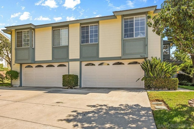 view of front of property featuring a garage