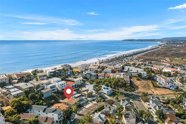 aerial view featuring a beach view and a water view