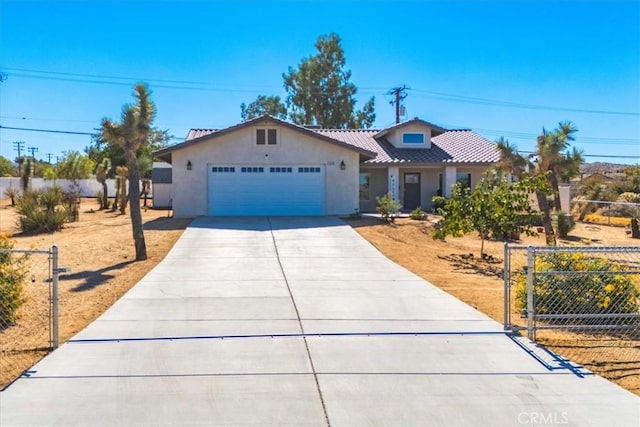 view of front of property with a garage