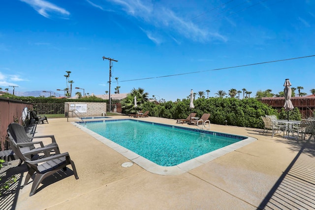 view of pool with a patio