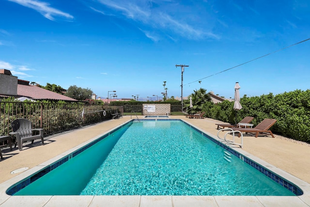 view of pool with a patio area