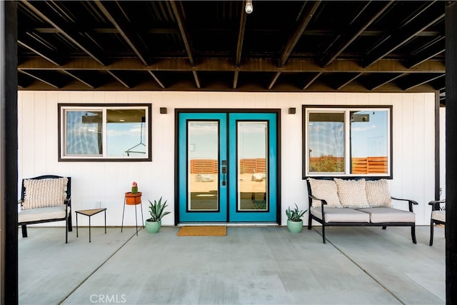 entrance to property with a patio