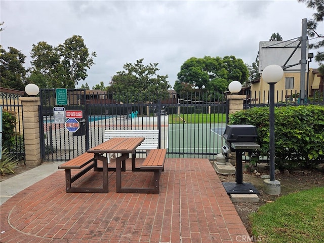 view of patio with a grill