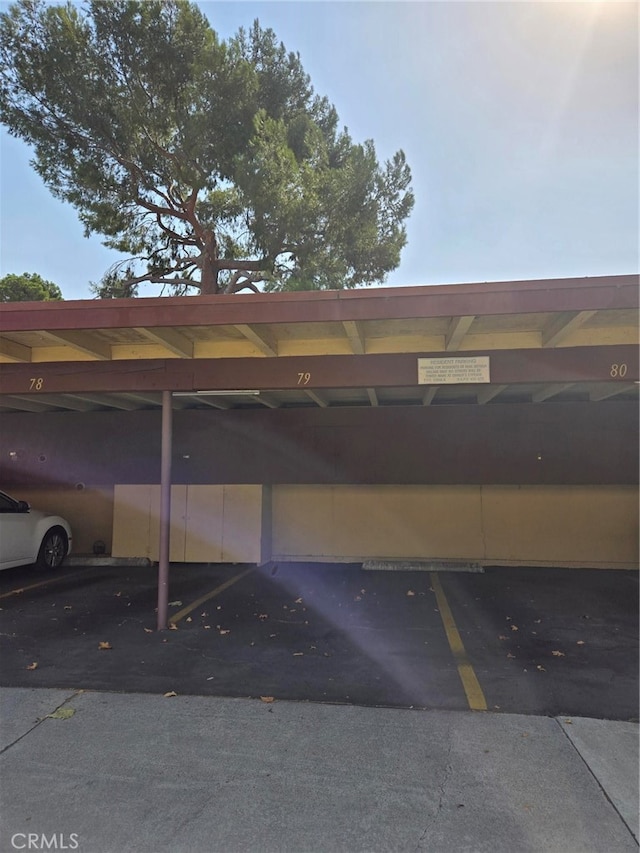 view of car parking featuring a carport