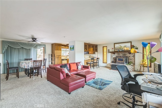 living room featuring carpet floors and ceiling fan