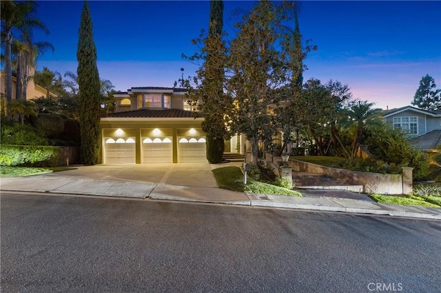 view of front of house with a garage