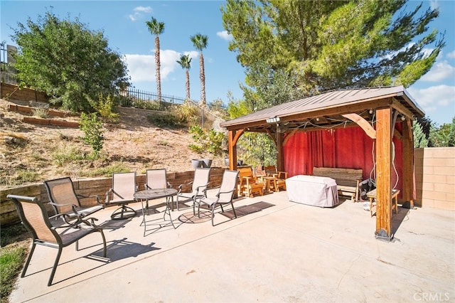 view of patio / terrace featuring a gazebo and an outdoor hangout area