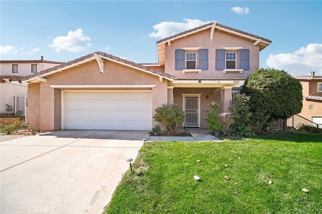 front of property featuring a front lawn and a garage