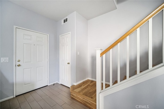 entryway with wood-type flooring