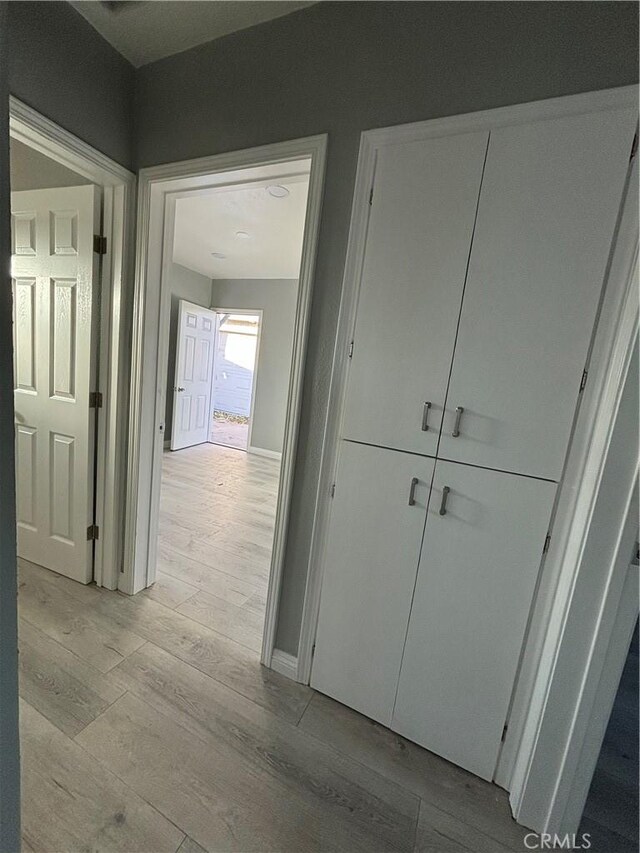 hallway featuring light wood-type flooring