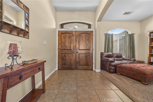 view of tiled foyer entrance