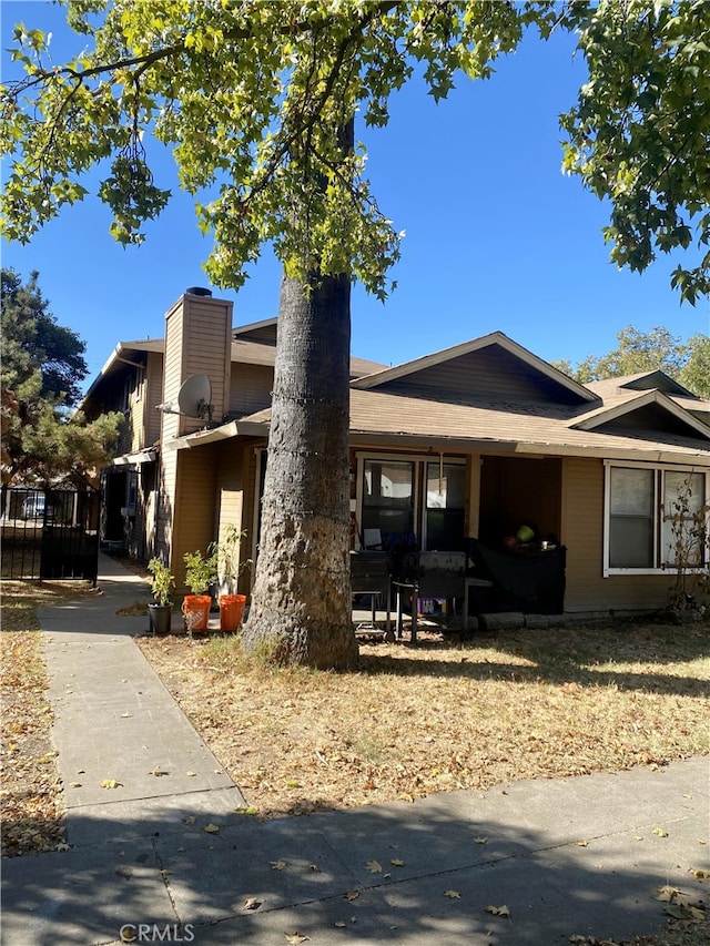 view of front of property with a chimney