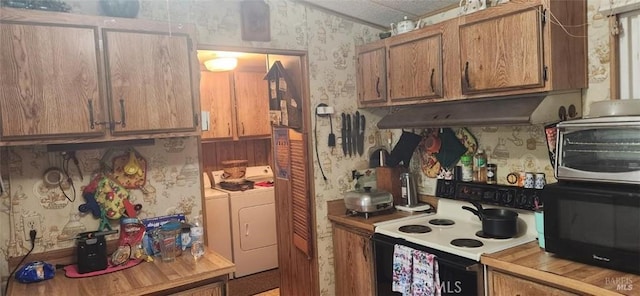 kitchen with separate washer and dryer and white electric stove