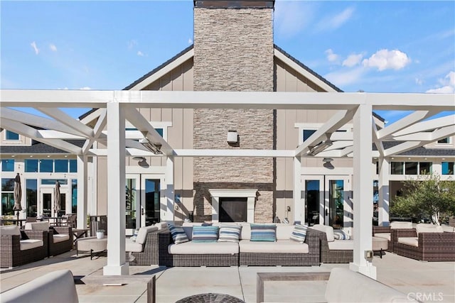 view of patio / terrace with an outdoor hangout area and french doors