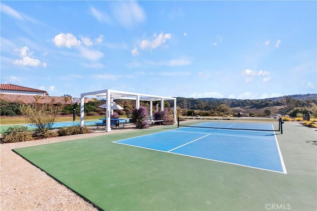 view of sport court featuring a mountain view