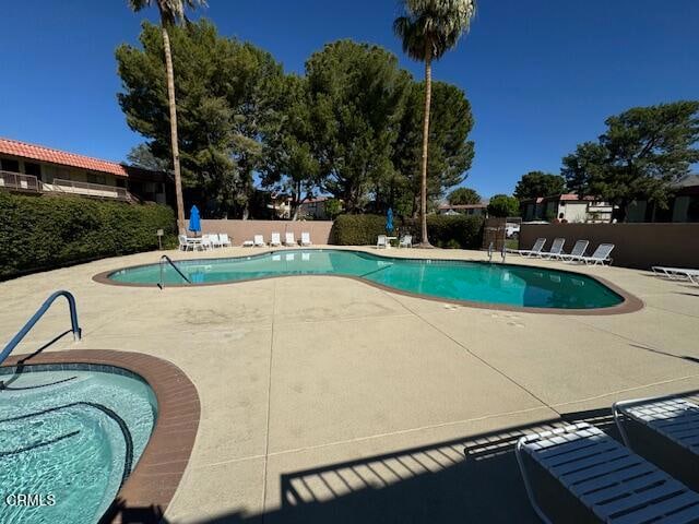 view of pool with a patio area