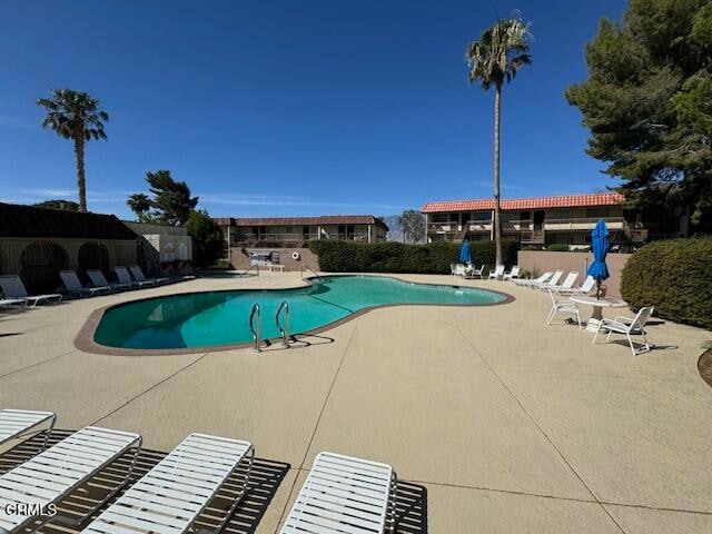 view of pool with a patio