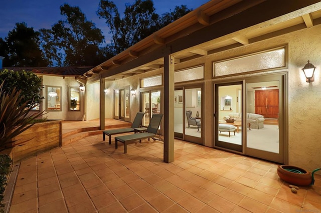 view of patio at twilight