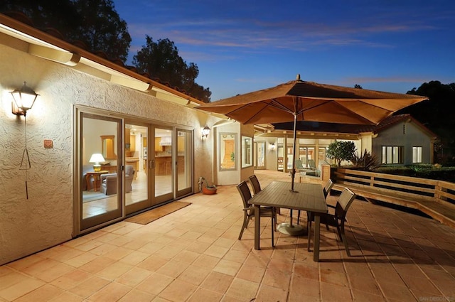 patio terrace at dusk with french doors