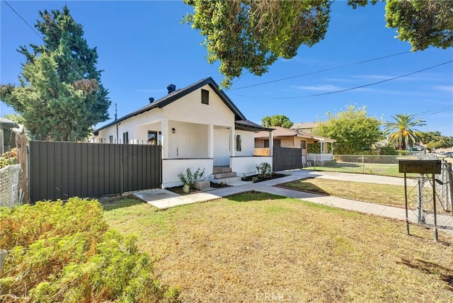 view of front of home with a front yard