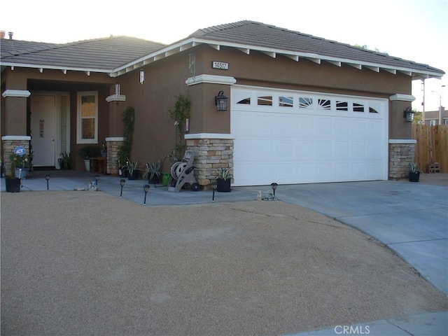 view of side of home with a garage