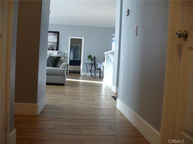 corridor featuring light wood-type flooring