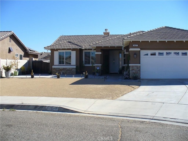 single story home with a garage