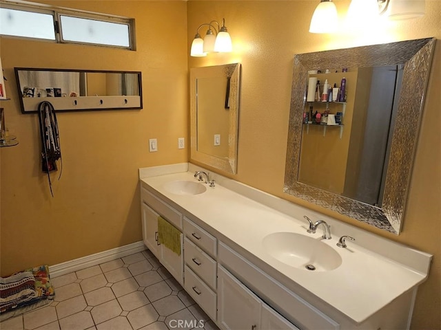 bathroom with vanity and tile patterned flooring