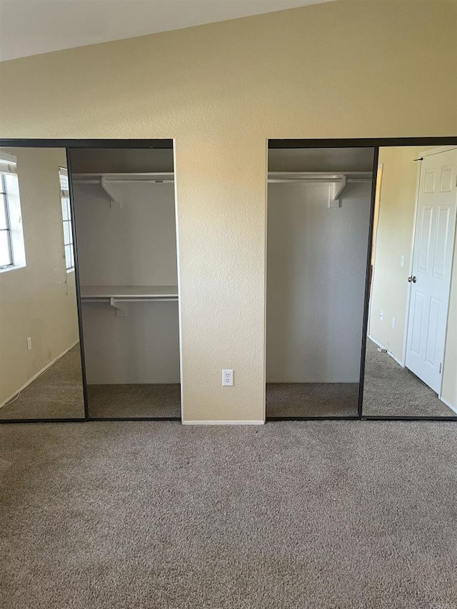 unfurnished bedroom featuring carpet