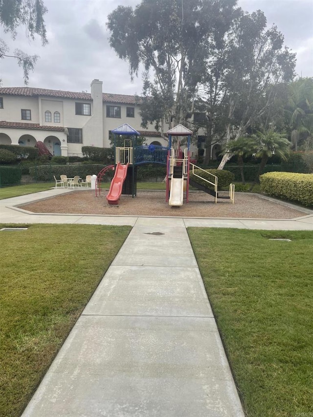 view of play area featuring a yard