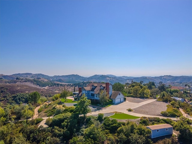 drone / aerial view featuring a mountain view