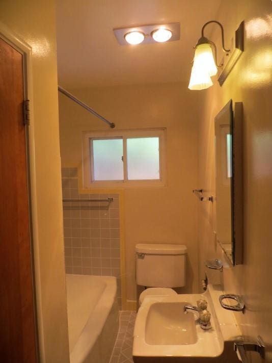 bathroom featuring sink and tile patterned floors