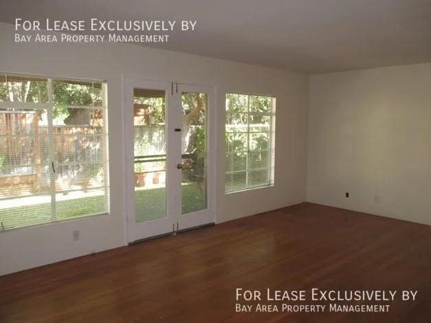 doorway to outside with dark hardwood / wood-style flooring