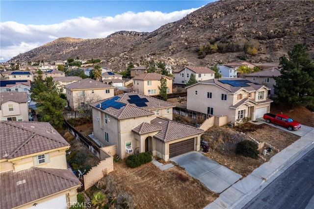 bird's eye view with a mountain view