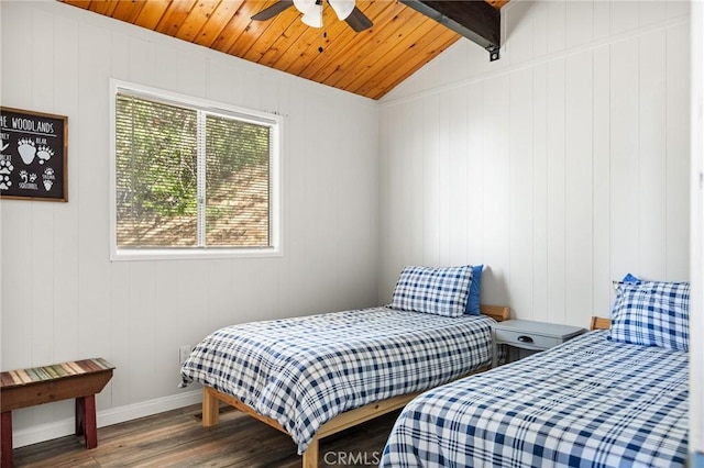 bedroom featuring baseboards, wooden ceiling, wood finished floors, and lofted ceiling with beams
