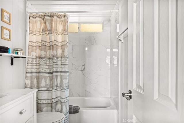 bathroom featuring shower / bathtub combination with curtain, vanity, and toilet