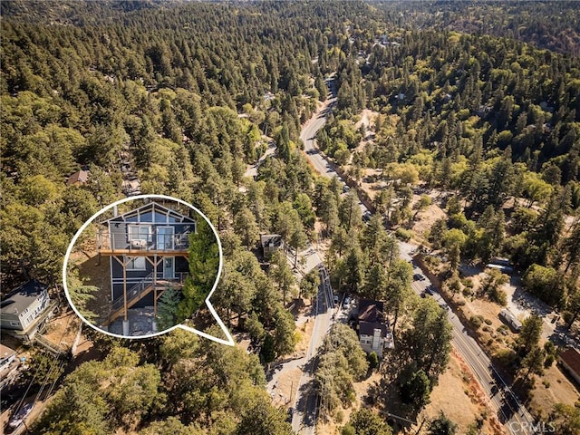 drone / aerial view with a forest view