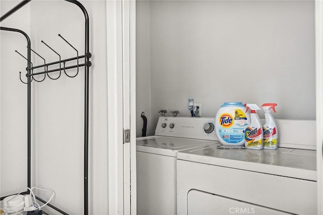 laundry area featuring separate washer and dryer