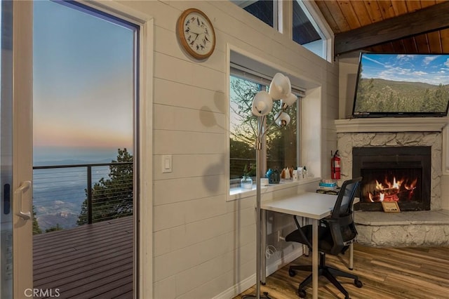 31600 City Creek Rd, Running Springs, CA 92382 - office featuring wood finished floors, a stone fireplace, and beam ceiling