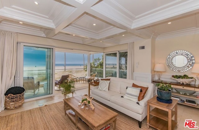 sunroom featuring beamed ceiling, coffered ceiling, and a water view